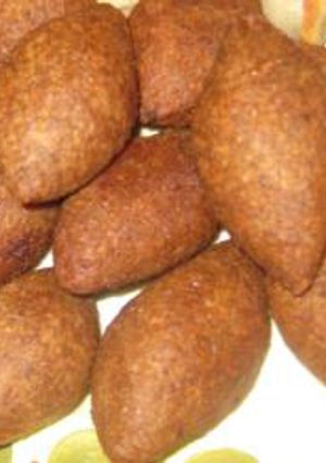 A picture of Kibbeh meatballs - kibbeh 'rass.