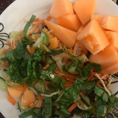 A picture of Veggies and fruits salad.