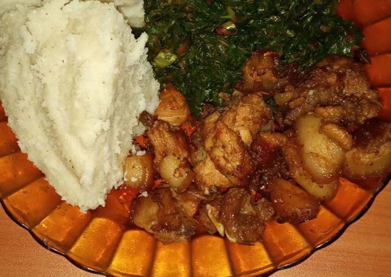 Ugali, fried pork and vegetable (sukuma wiki)# vegetables