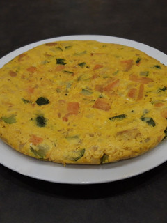 Una foto de Tortilla de calabacín y boniato especiado