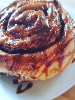 A picture of Cinnamon rolls with coffee glaze.