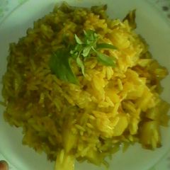 A picture of My simple jollof rice wit potatoes an mince meat.