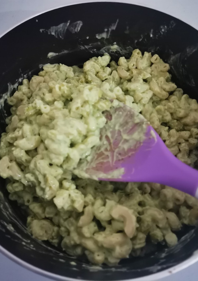Una foto de Pasta con crema de cilantro