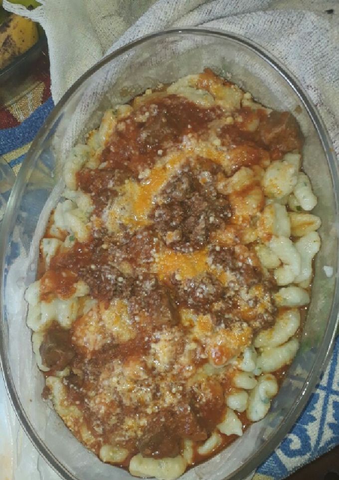 Una foto de Ñoquis de papa con salsa