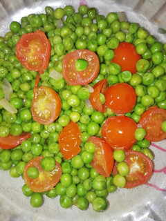 Una foto de Guisantes con tomates