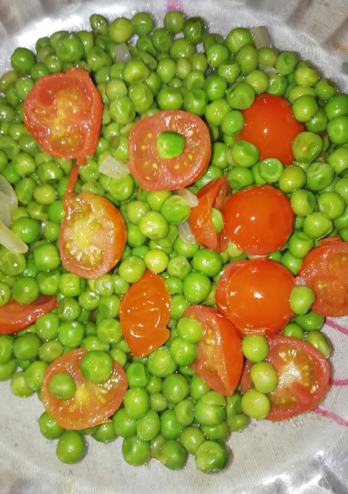 Una foto de Guisantes con tomates