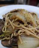 Marinaded steak strips with noodles