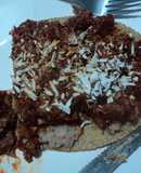 Huarache pa' enamorados con coco y chicharrón prensado agridulce Don Geras