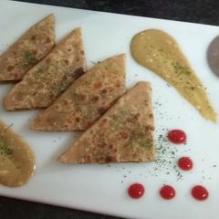 A picture of Onion Tomato Stuffed Paratha.