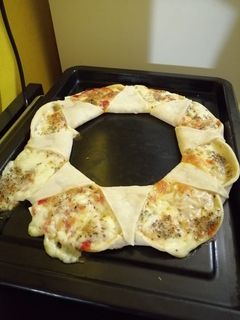 Una foto de Pizza corona