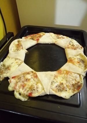 Una foto de Pizza corona