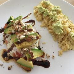A picture of Chicken avocado with balsamic vinegar & rissini.