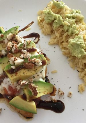 A picture of Chicken avocado with balsamic vinegar & rissini.