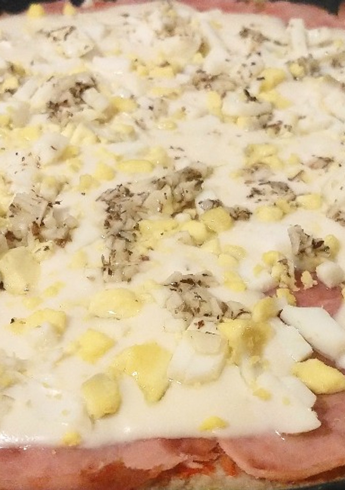 Una foto de Pizza casera sin tacc, masa saludable (sin premezcla o premezcla casera)