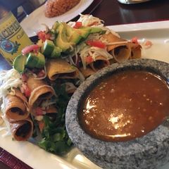 A picture of Beer beef taquitos.