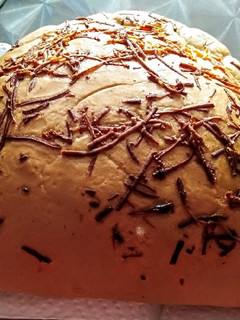 Una foto de PANOCHA Costeña, rellena de Queso, Azúcar y Coco...!