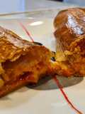 Puff Pastry Roll Filled with Marinated Pork Loin and Cheese
