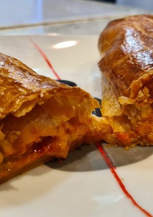 A picture of Puff Pastry Roll Filled with Marinated Pork Loin and Cheese.