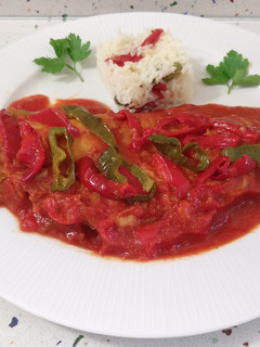 Una foto de Bacalao con tomate