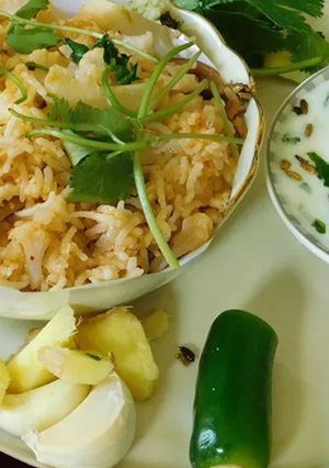 A picture of Cilantro pachadi, onion pachadi with Curd.