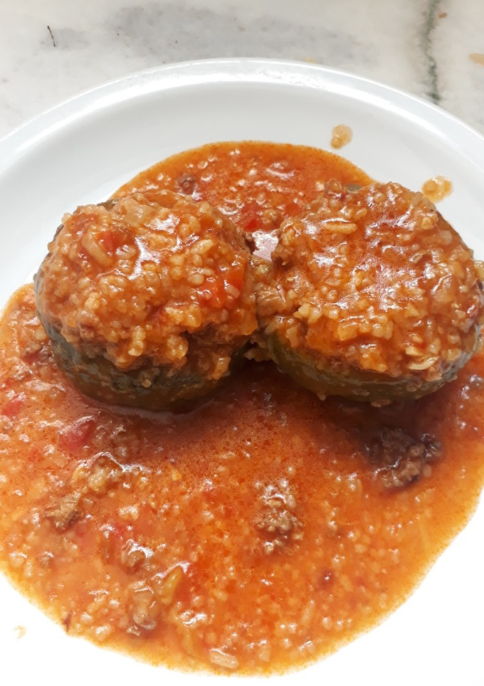 Una foto de Zapallitos Verdes Rellenos En salsa de tomate