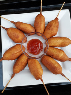 A picture of Corn dogs.