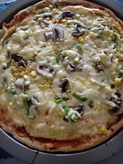 Una foto de Pizza casera con extra queso