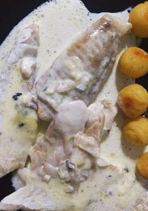Una foto de Filet de merluza al roquefort