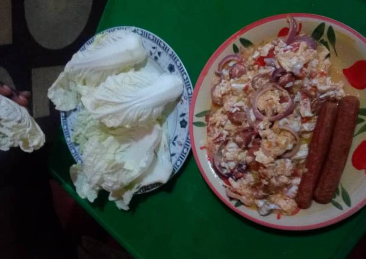 Fried egg sausages and cabbage