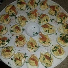 A picture of truffle deviled eggs with lox.