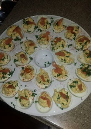 A picture of truffle deviled eggs with lox.
