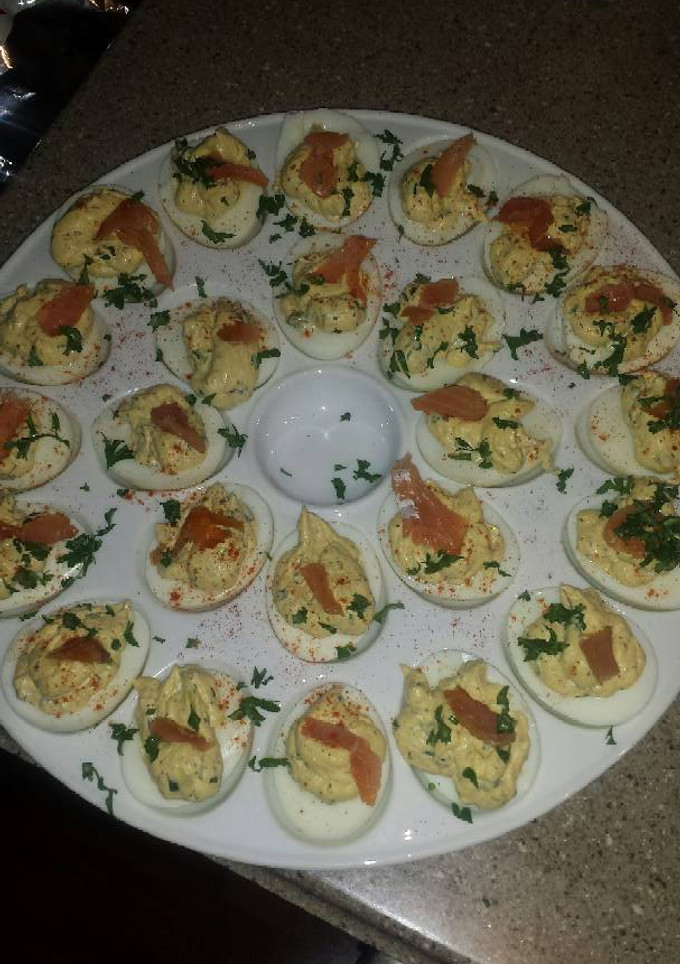 A picture of truffle deviled eggs with lox.