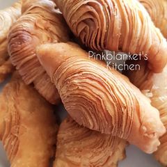 Flaky Spiral Curry Puffs A picture of Flaky Spiral Curry Puffs.