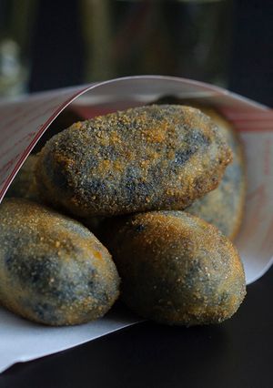 Foto principal de Croquetas de calamar en su tinta