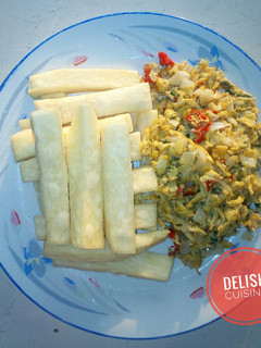 A picture of Fried yam and scrambled eggs.