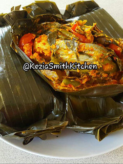 A picture of Steam Fish in Banana Leaves.