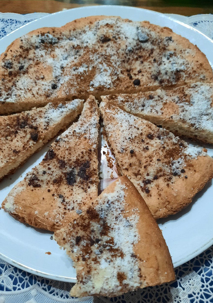 Una foto de Torta chata matera azucarada