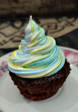 Una foto de Cupcakes de chocolate y merengue