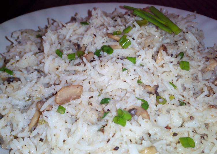 Steps to Make Perfect Mushroom Rice with sesame seeds and oregano