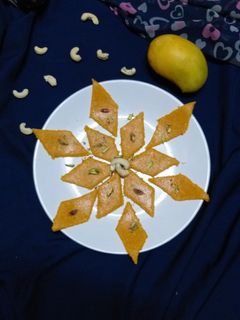 મેંગો કાજુ કતલી(Mango Kaju Katli recipe in Gujarati) રેસીપી મુખ્ય ફોટો