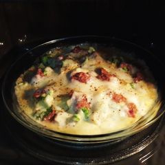 A picture of Baked Potatoes with Broccoli and Cheese.