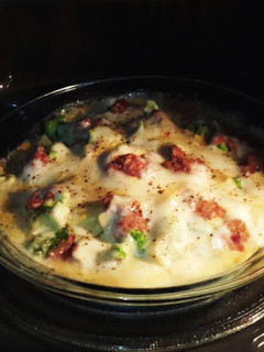 A picture of Baked Potatoes with Broccoli and Cheese.