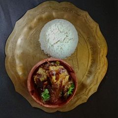 A picture of Champaran style Ahunna Mutton in Handi.