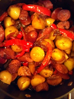 A picture of Kielbasa potatoes and peppers.