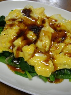 A picture of Spinach with Soft-Cooked Eggs.