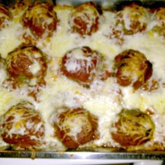 A picture of Vermont Cheddar Stuffed Meatballs with baked spaghetti..