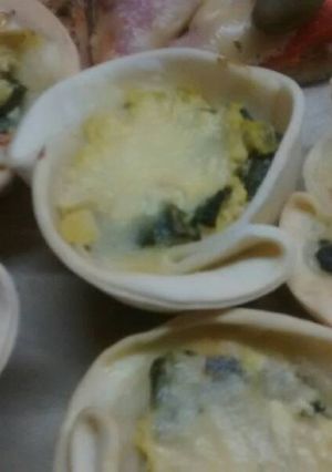 Una foto de Canastas de zucchini jamón y queso