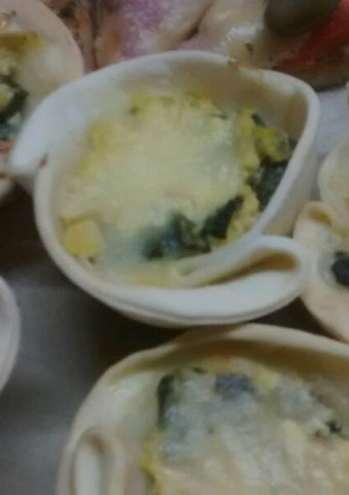 Una foto de Canastas de zucchini jamón y queso