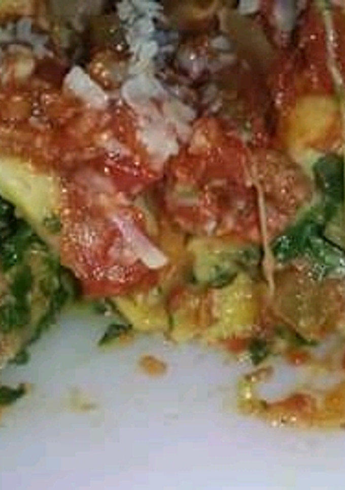 Una foto de Canelones de verdura jamón y queso