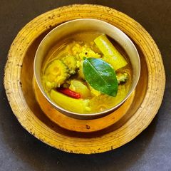 A picture of Shukto Dal with Pumpkin, Cucumber, Korola.